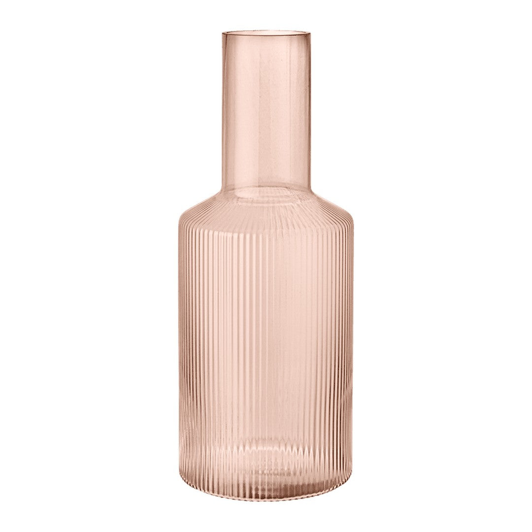 Blush pink glass vase with vertical ribbed patterns, perfect for adding a touch of elegance to any decor.