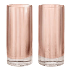 Set of two ribbed glass tumblers in soft pink with clear bases, showcasing a modern and elegant design.