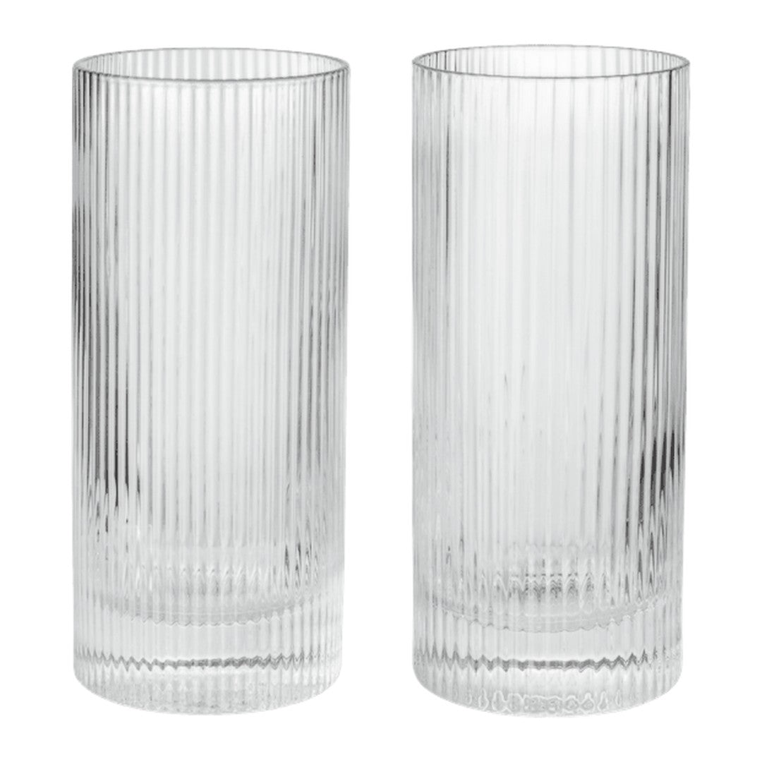 Clear glass tumblers with elegant vertical ribbed texture, perfect for modern table settings.