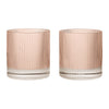 Set of two ribbed glass tumblers in soft pink and clear, featuring vertical striped patterns for a modern look.