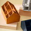 "Stylish organizer in warm orange, sleek navy, and neutral gray on soft pastel backdrop."